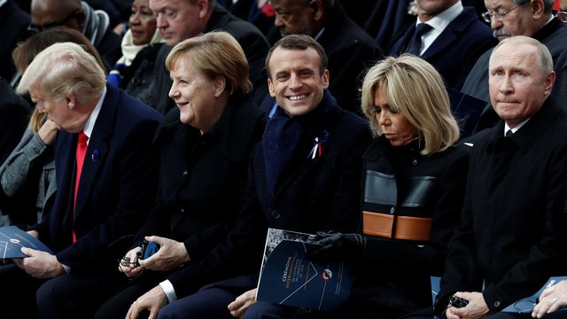 Donald Trump, Angela Merkel, Emmanuel Macron, Brigitte Macron y Vladimir Putin