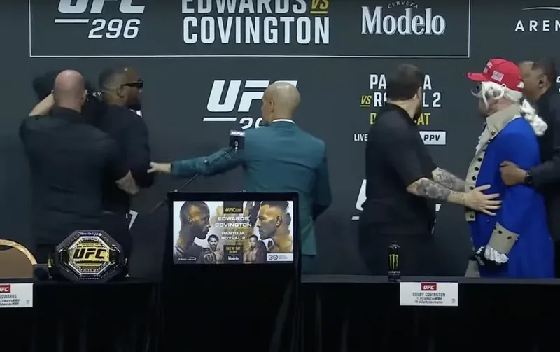 Едуардс замери Колби с бутилка преди UFC 296