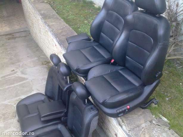 25439661_8_644x461_interior-piele-neagra-seat-to