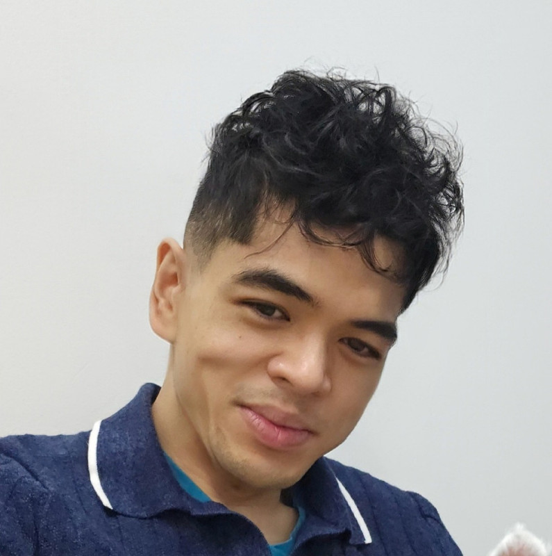 Professional Headshot of John Victor Ubana