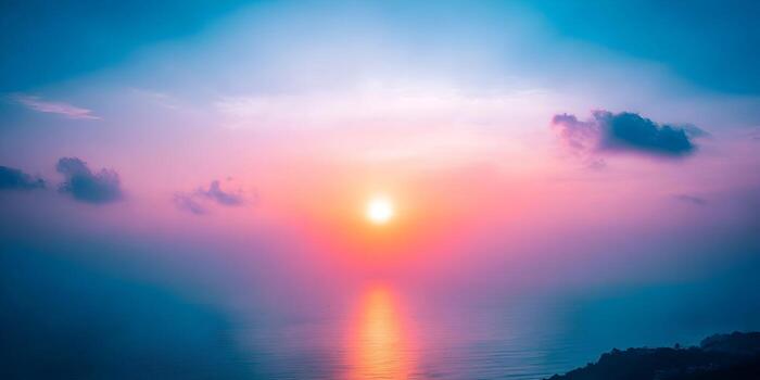 a breathtaking sunset paints the sky and ocean with vibrant hues of pink purple and blue creating a