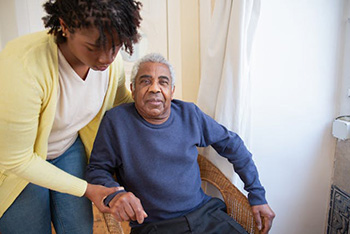 A woman taking care of elderly