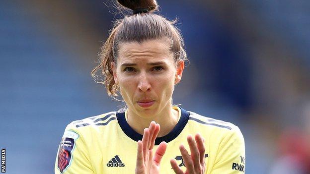 Tobin Heath warming up