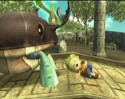 Lucas using his survival meta: pretending to be dead in front of a giant beetle.