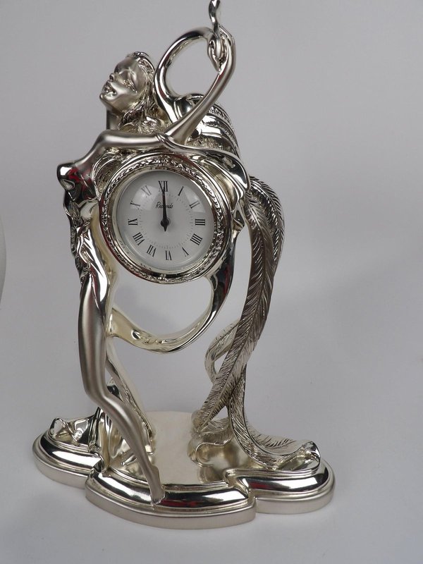 clock-silver-figurine.jpg