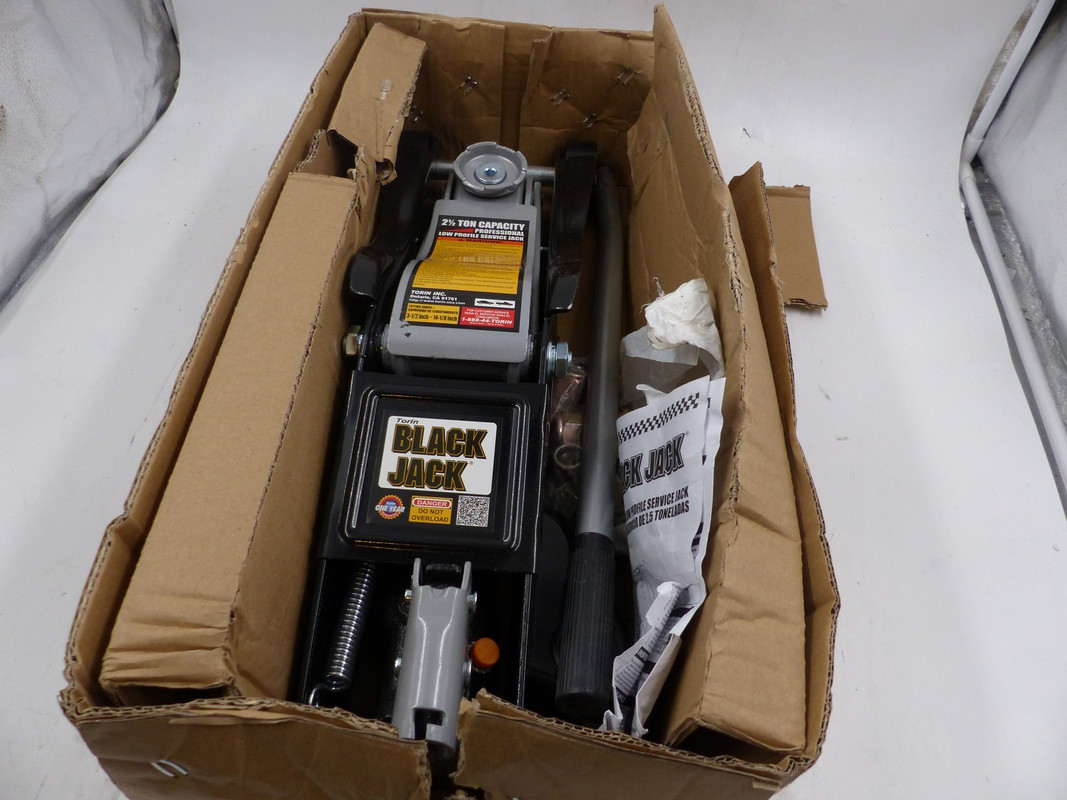 TORIN BLACK JACK AT825010B 2 1/2 TON CAPACITY LOW PROFILE SERVICE JACK TORIN BLACK JACK AT825010B 2 1/2 TON CAPACITY LOW PROFILE SERVICE JACK