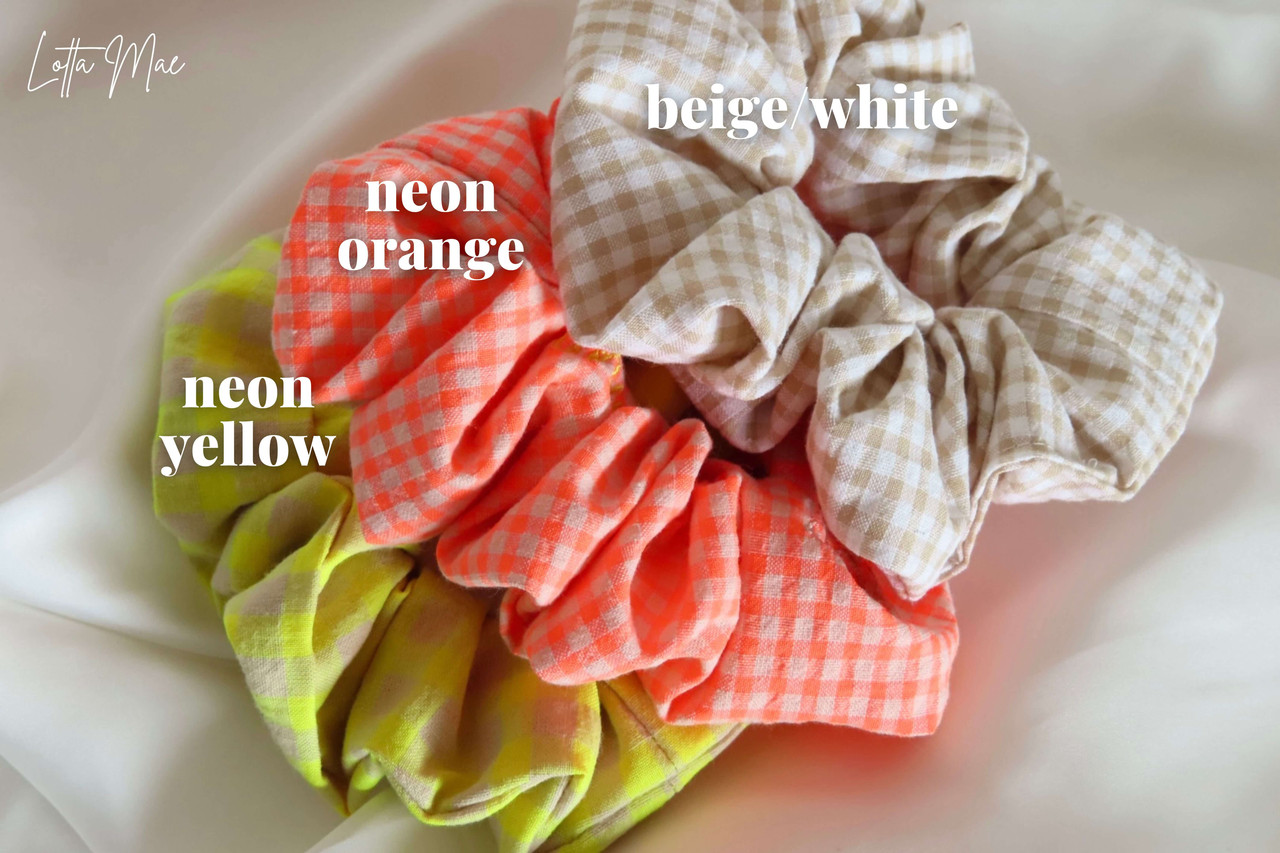 Make your hair accessory truly yours with a personalised embroidered scrunchie from Lotta Mae Barcelona. Choose your own name, text or initials - hand-embroidered onto a soft, stretchy scrunchie. Perfect as a gift, for weddings, bachelorette parties or just for yourself. Available in a range of fabric and thread colours.