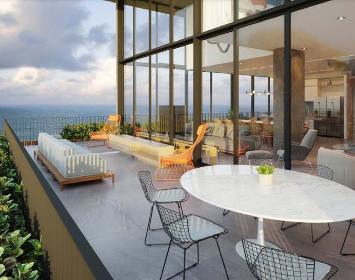 Área externa da cobertura do Essenza Paiva com design sofisticado e vista para o mar