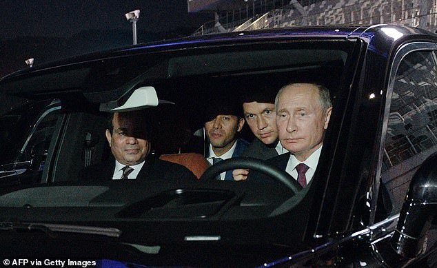 51719621-10303651-Vladimir_Putin_pictured_sitting_behind_a_wheel_during_a_visit_to-m-21_163938544602