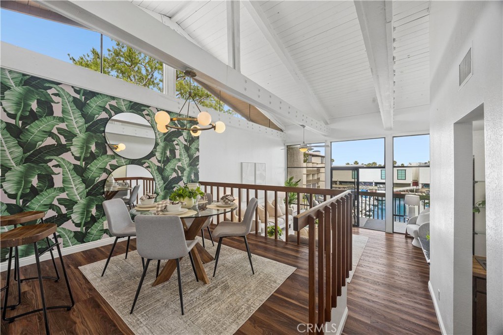 Interior dining and living area at 7303 Marina Pacifica Drive, Long Beach, California