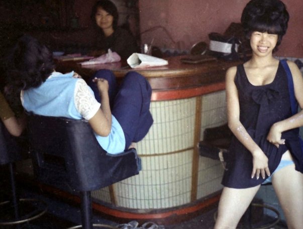 ^3 on olde picture of a Cambodian bar to draw attention to review