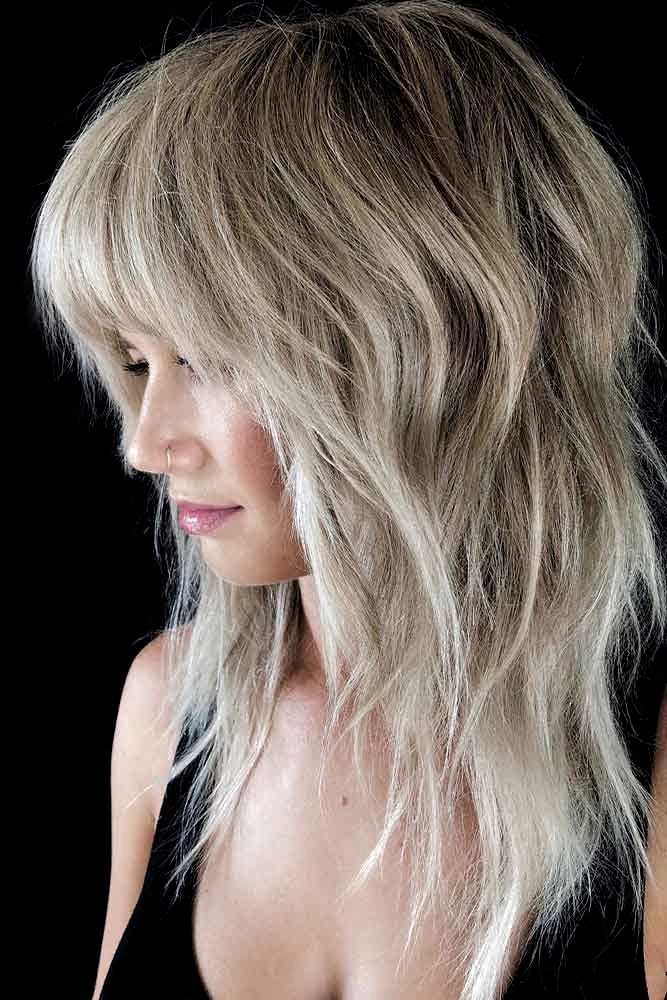 Blond hair short and long layers classic octopus haircut