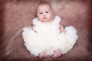 cute-baby-in-her-newborn-smitten-cream-pettiskirt-and-pettitop