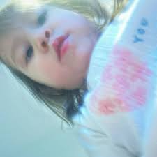 selfie taken by cute toddler, probably unexpectedly.