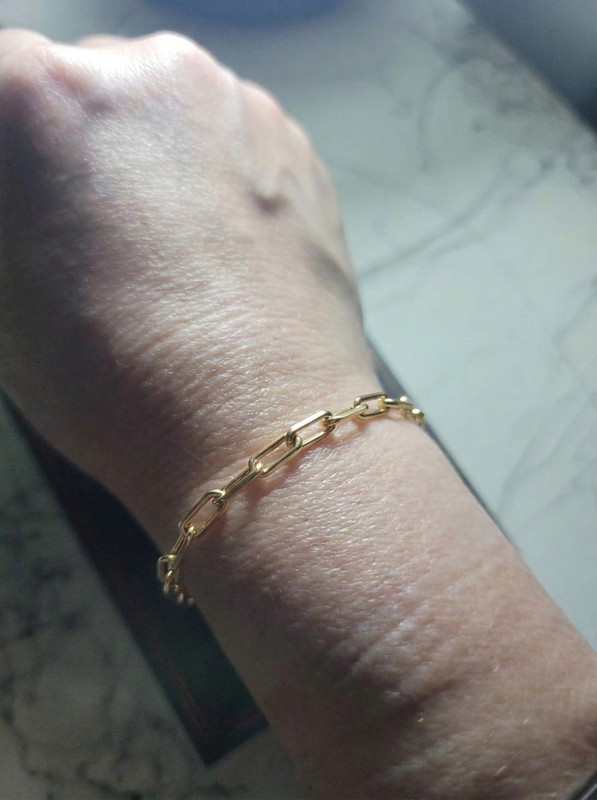 Adding gold bracelet to hand 202608291502