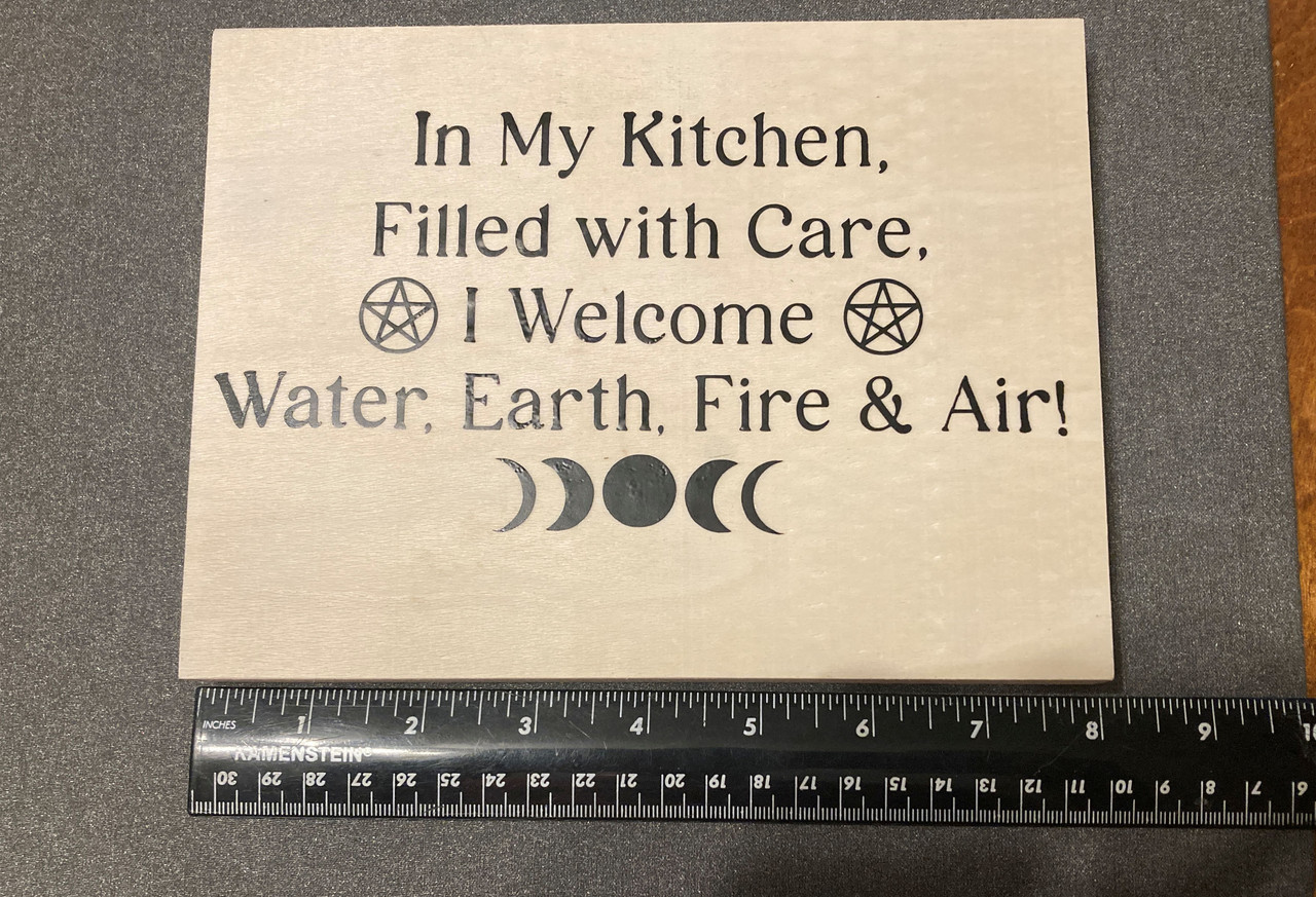 handcrafted elemental kitchen sign