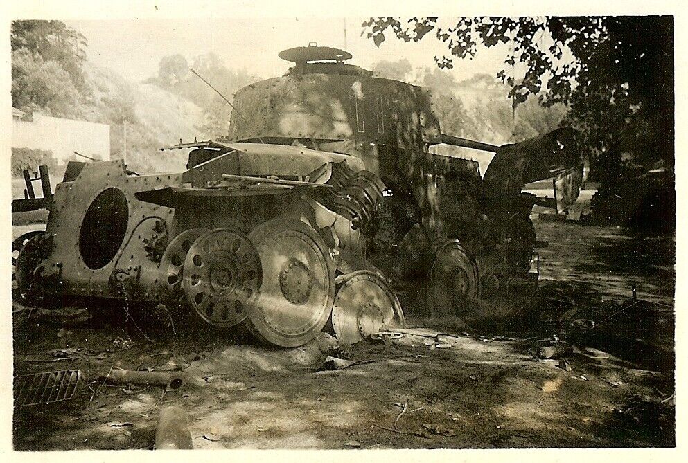 German View of Heavily Hit KO'd Pzwk.38(t) Panzer Tank 115 on Road!