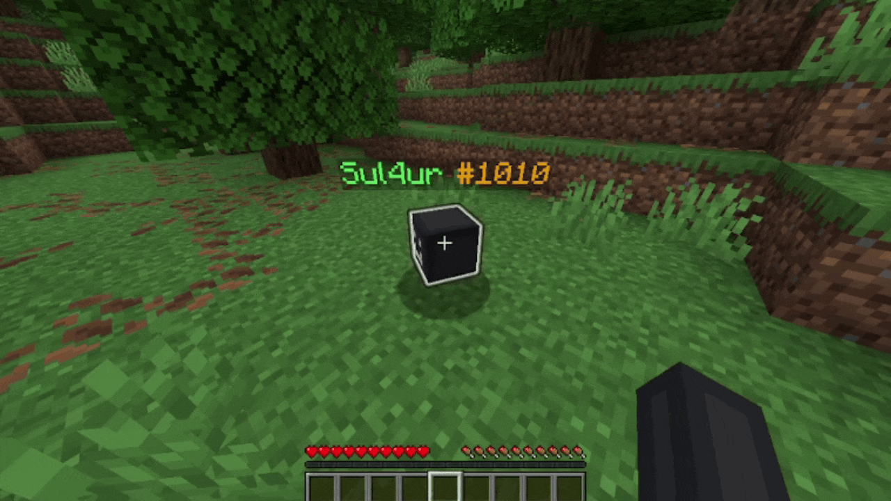 The player left-clicking on the grave. The grave drops all of its items and XP for the player to collect.