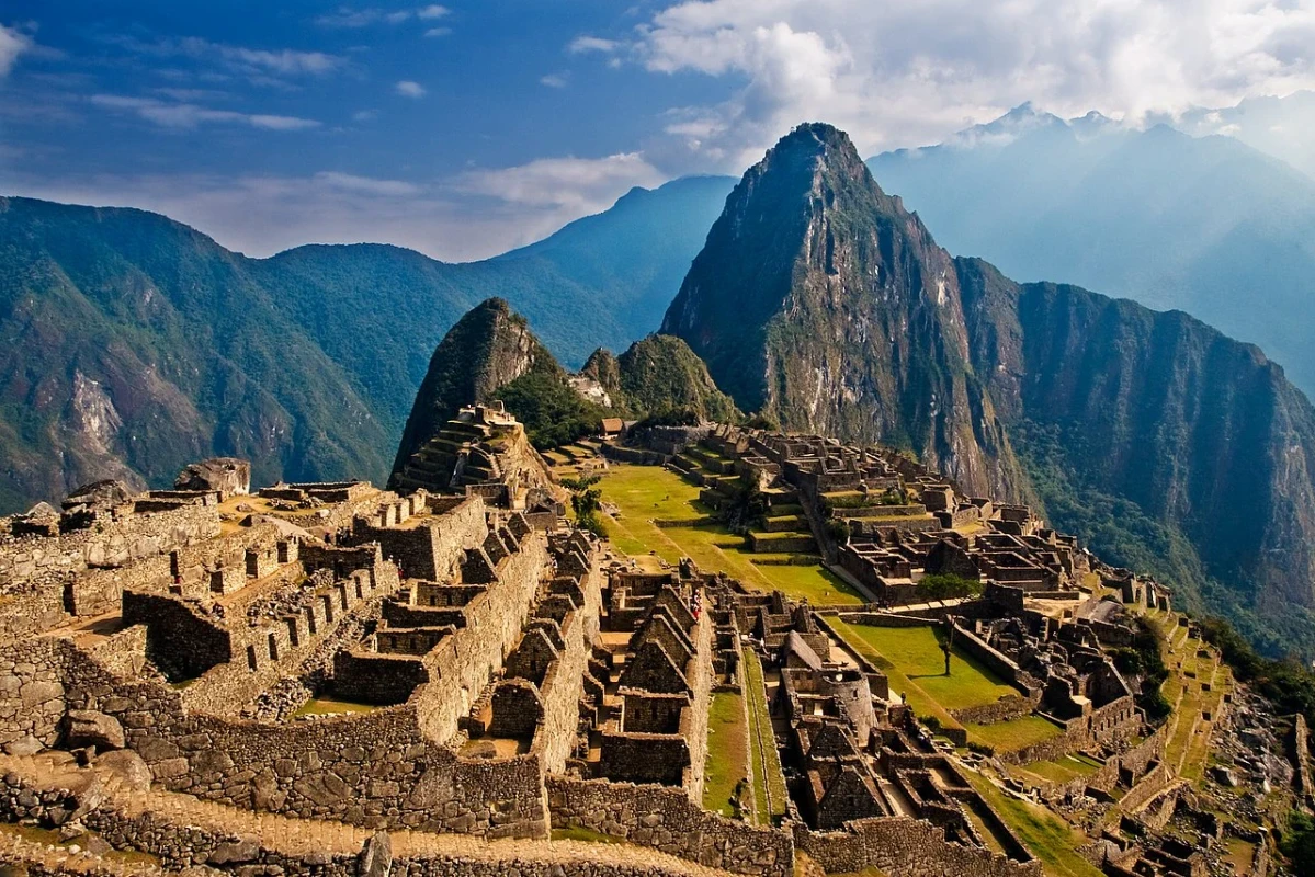 Machu Picchu - The Lost Inca City in the Andes Mountains Panoramic view of Machu Picchu in the Andes Mountains, Peru