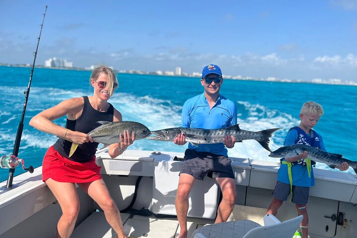 Pura Vida 35 ft yacht charter Cancun - Interior view showing luxury amenities and comfortable seating for 6 guests
