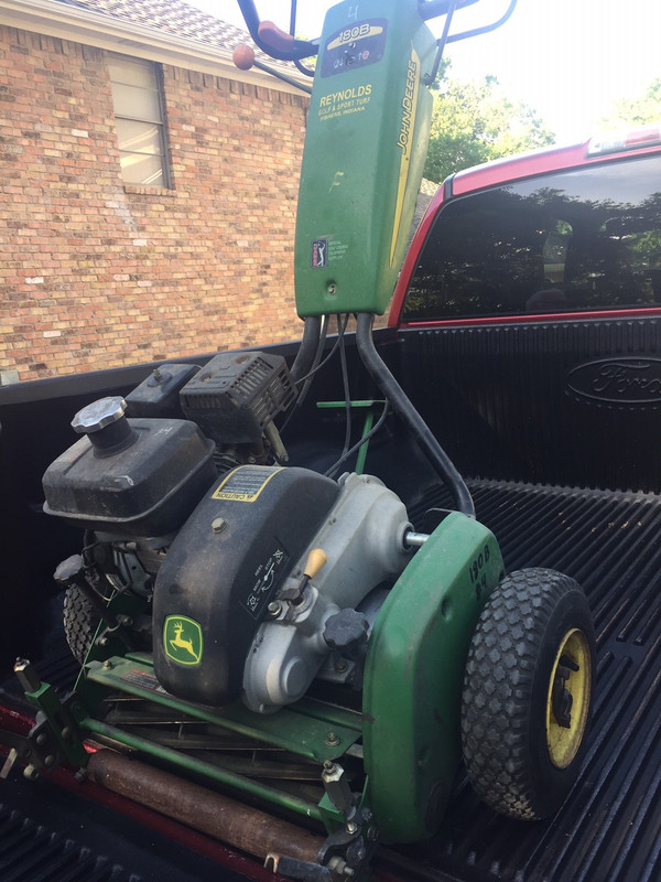 John deere riding mower blowing white smoke