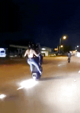 motorcycle-girl-wheelie.gif