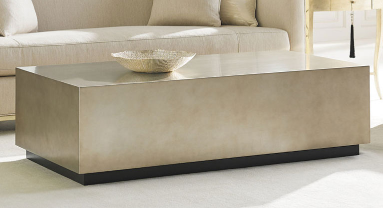 A designer’s dream, this 60-inch by 30-inch cocktail table will work anywhere that calls for a little refined elegance. A demurely Taupe Silver Leaf finish has a hint of sparkle and the fade-away black base in Almost Black secures this design in place. Group two or three together for a real crowd pleaser!
