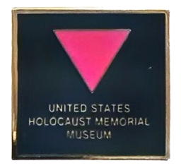 a black enamel pin that has an upside down pink triangle on it, and the text 'UNITED STATES HOLOCAUST MEMORIAL MUSEUM' under it