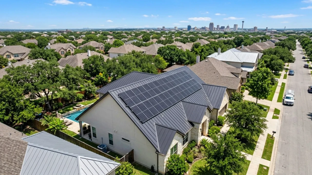 Solar panels on standing seam metal roof aerial view San Antonio Texas