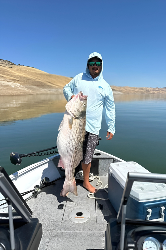 Father and son celebrating a big catch
