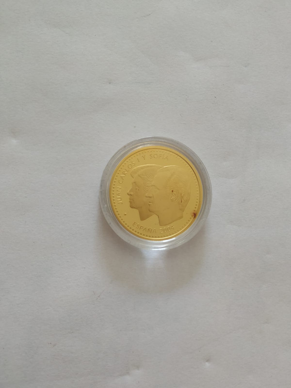 Dudas para limpiar esta moneda de oro conmemorativa IMG-20190714-WA0095
