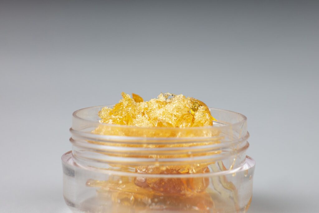 Wazzup Hash Baller Jar 3.5‑gram solventless hash rosin with bold flavors like Pink Punch, Grape, Peach Ringz, Blueberry Diesel, Tropical Gelato, and Zaza.