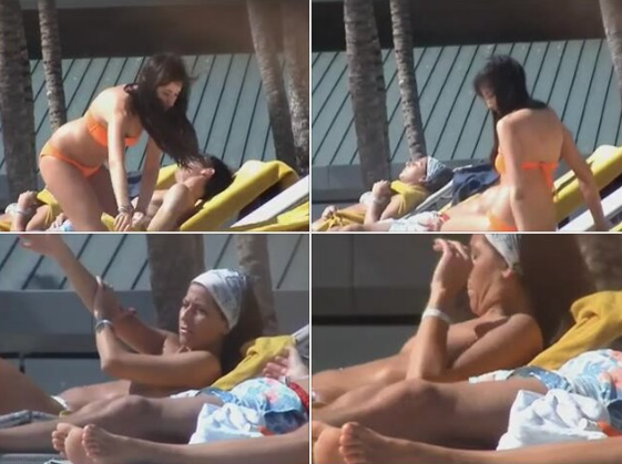 spying on sultry spanish brunette tanning her body topless