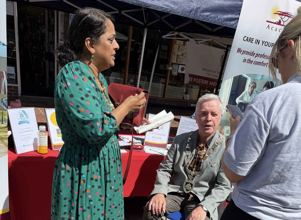 Runnymeed Counciler at the Acacia Homecare booth at Magna Carta Day