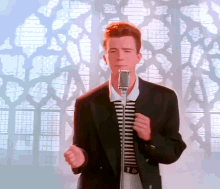 https://i.postimg.cc/j5qBqrdd/rick-astley-never-gonna-give-you-up.jpg