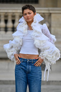 Zendaya-Braless-White-Top-Paris385
