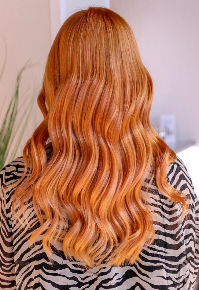 Radiant strawberry coral copper hair look