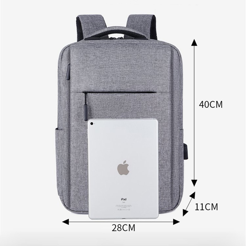2026 hot-selling custom slim business laptop backpack with USB charging port placed on luggage case, featured as best B2B corporate gift choice