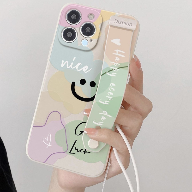 Foto de Funda con diseño de sonrisa. Incluye correa de mano.