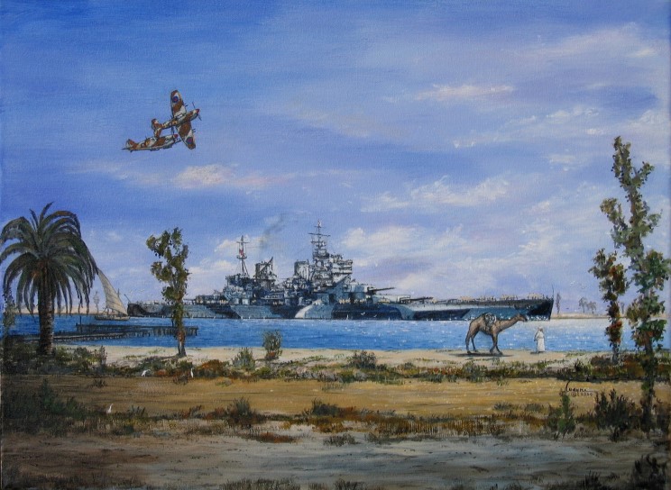 El HMS Howe cruza el Canal de Suez, sobrevolado por un par de Spitfires