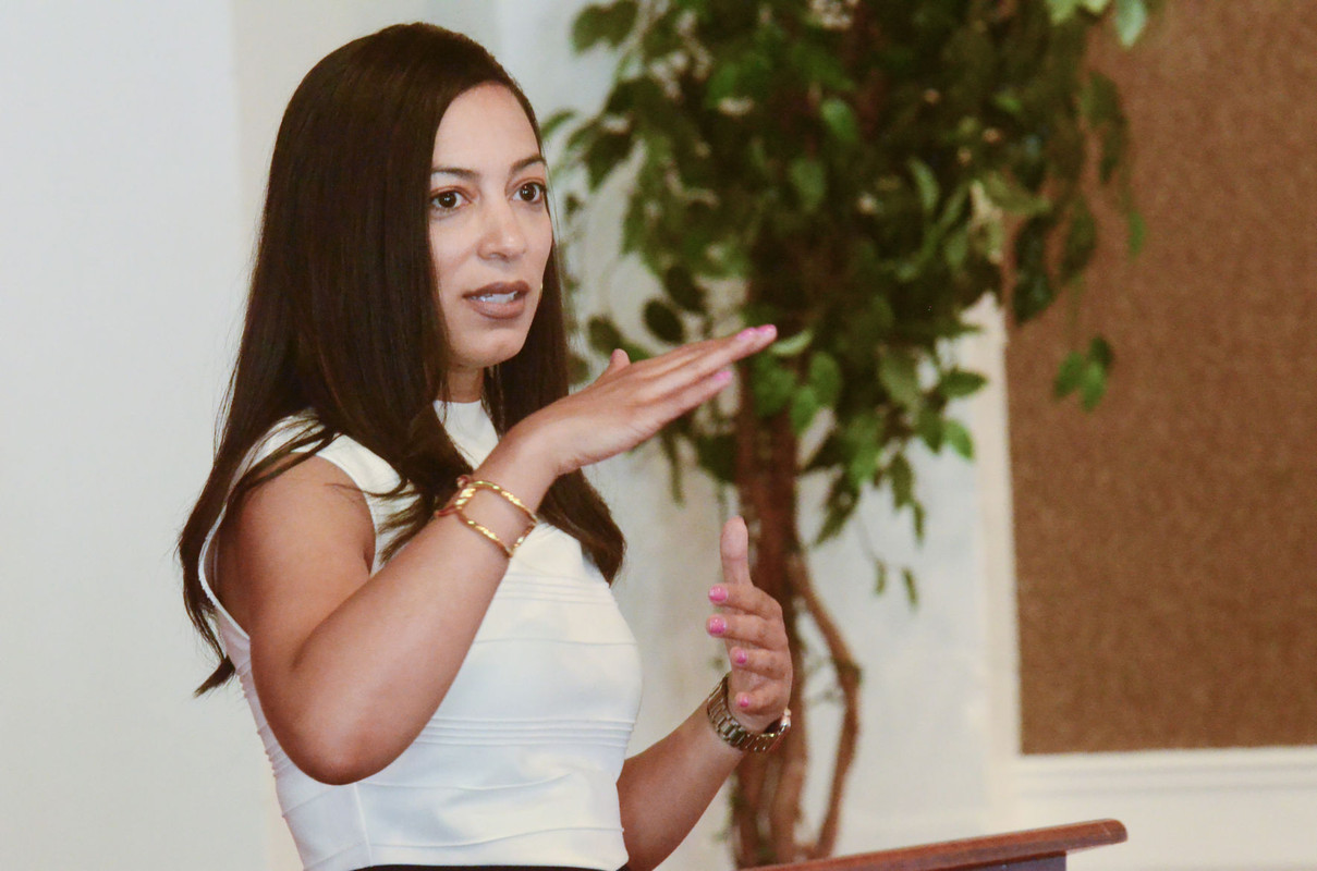 Angela Rye addressing an event