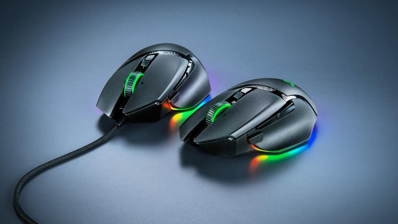 Two black computer mouses with colorful lightsDescription automatically generated Two black computer mouses with colorful lightsDescription automatically generated