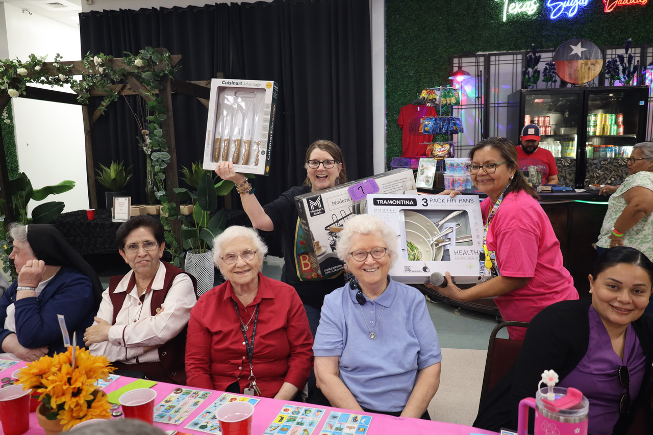 Families enjoying Blessed Sacrament Academy's annual Lotería fundraiser