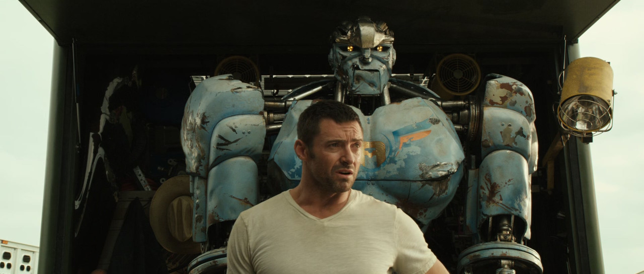 Real Steel (2011) + Extras (1080p BluRay x265 HEVC 10bit EAC3 7.1 English + French + Spanish SAMPA) [QxR]