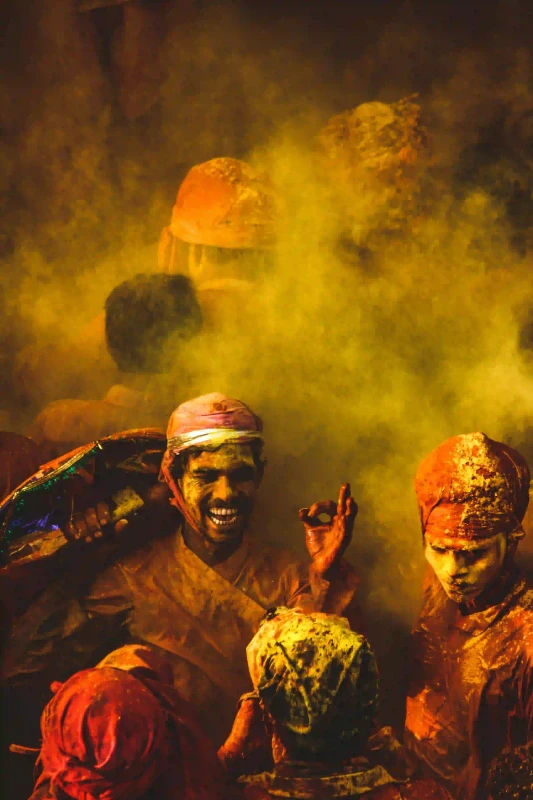 Traditional attire men playing Holi at Pushkar Mela ground