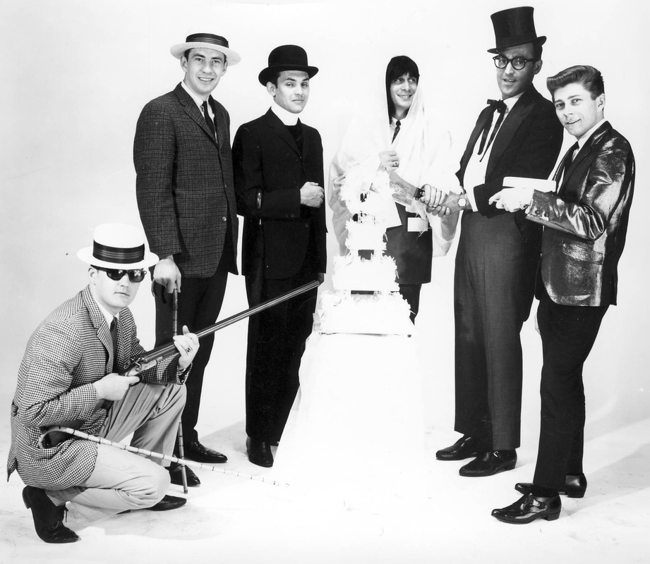1963 CKEY Good Guys. J. P. Finnegan, Duff Roman, Big G Walters, Lee Vogel (in drag), Bill Brady and 