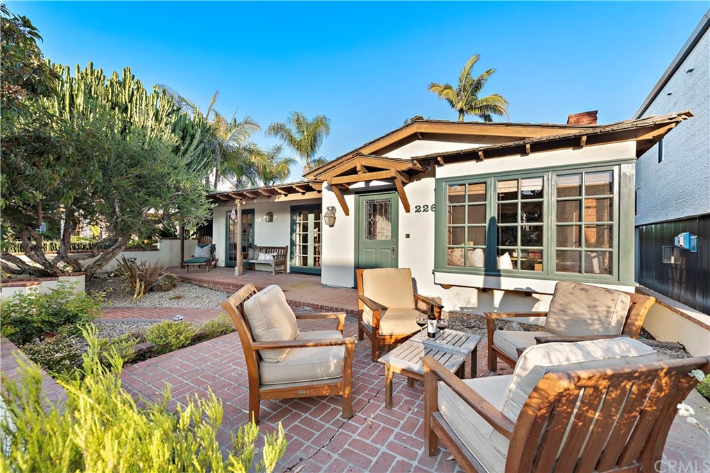 Outdoor patio and home exterior at 226 Jasmine Avenue, Corona del Mar, California