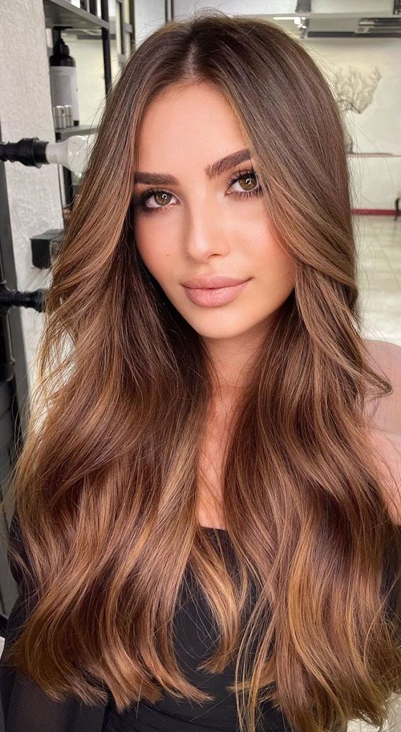 Long wavy caramel blonde hair on brunette