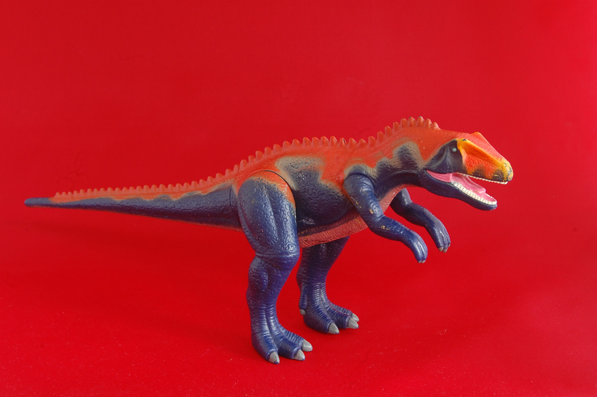 Заурофаганакс. Заурофаганакс динозавр Кинг. Заурофаганакс динозавр игрушка. АЛЛОЗАВРЫ. Красный игрушечный динозавр.