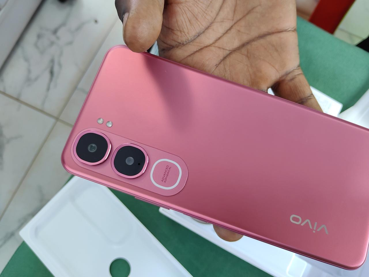 Close-up of a durable pink smartphone back with camera setup